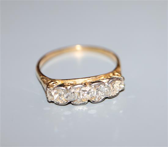 An 18ct and five stone diamond half-hoop ring, size S.